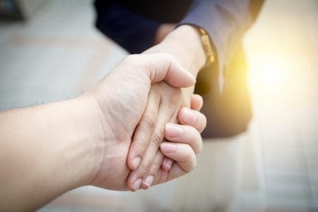 couple holding hands